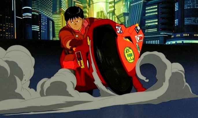 Un hombre vestido de rojo montando una motocicleta.