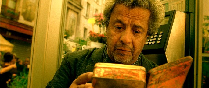 Amélie devuelve la caja a su dueño