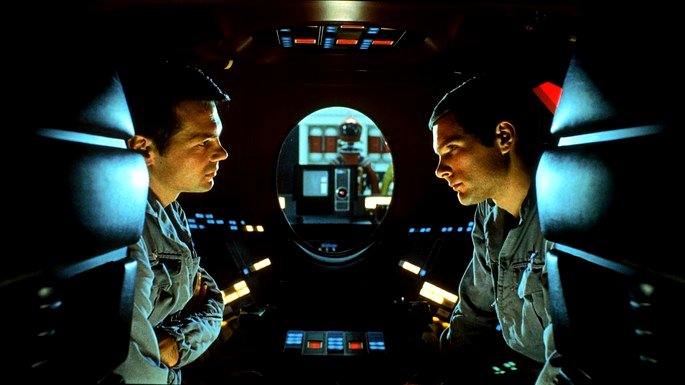 Fotograma: conversación entre astronautas.