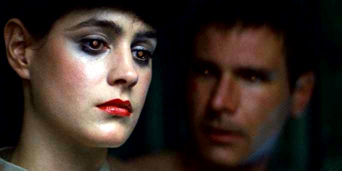 Deckard y Rachel en primer plano mostrando ojos con pupilas brillantes